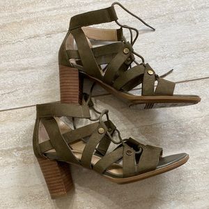 Army green strap block heel sandal with gold detail.